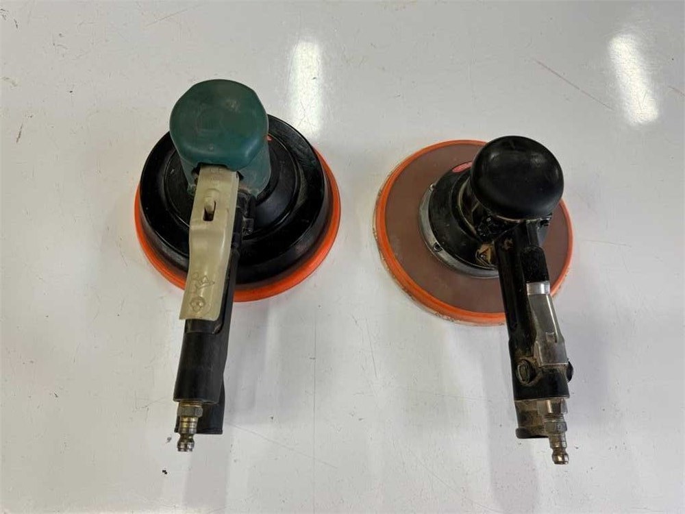 Two (2) Dynabrade Pneumatic Palm Sanders