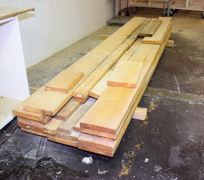 LOT OF WOOD ON RACKING * APPROX 10' LONG