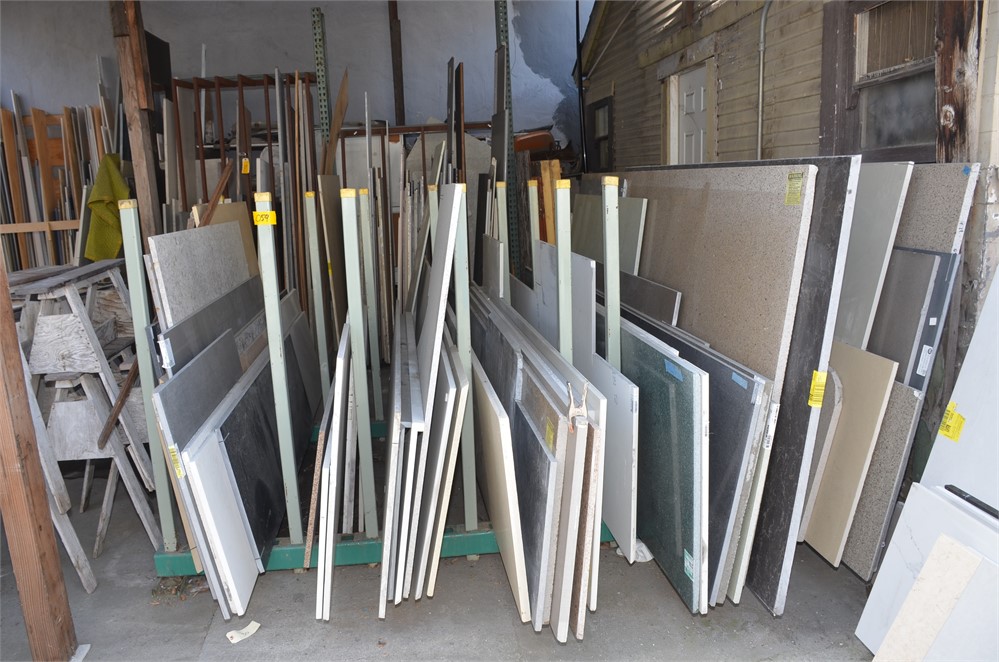 Stone slab material and storage rack