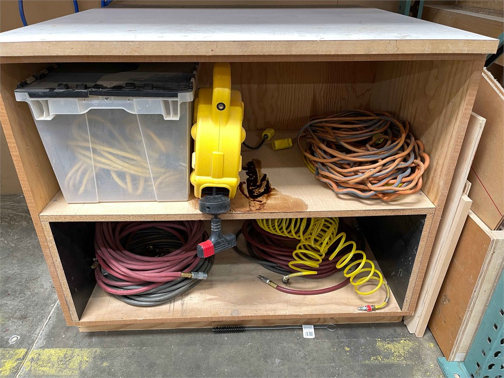 Assortment of Electrical Cords and Air Lines