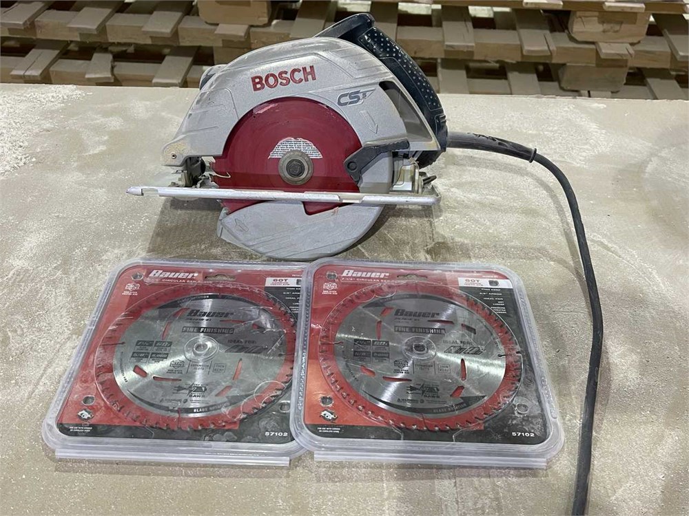 Bosch Power Saw and Two (2) New Blades