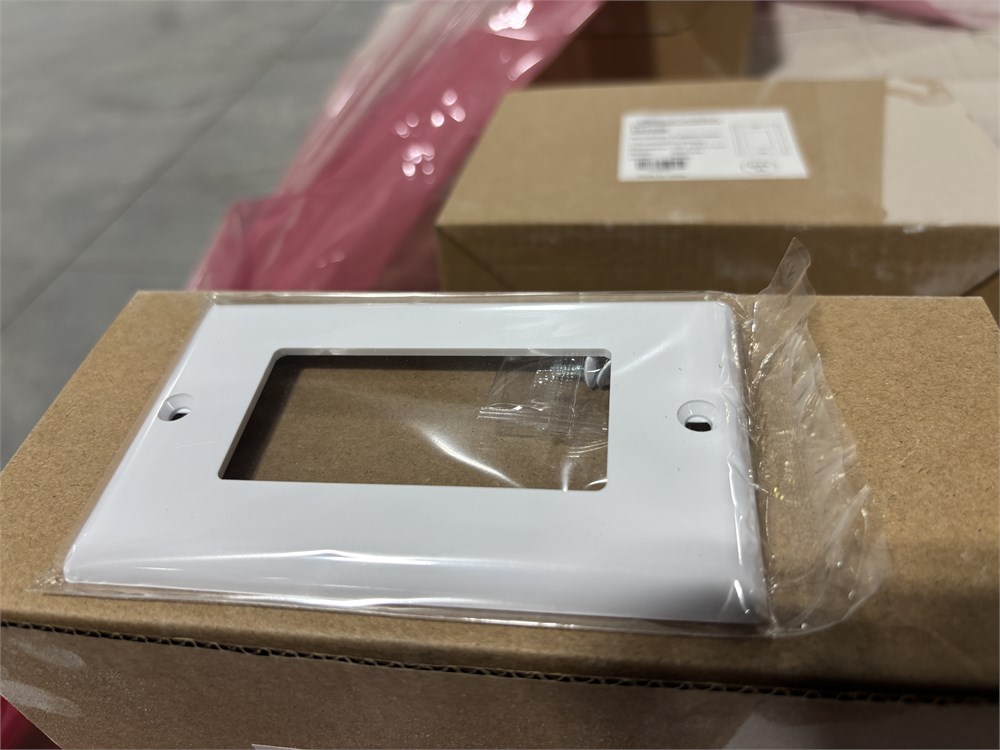 Pallet of Decora wall plates - as pictured