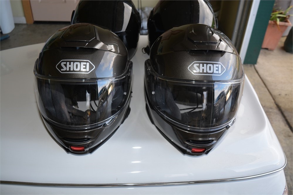 Two (2) Shoei Neotec II Helmets (one XL and one L),  Two (2) Bilt Helmets