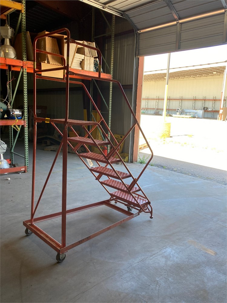 Louisville Rolling metal step ladder