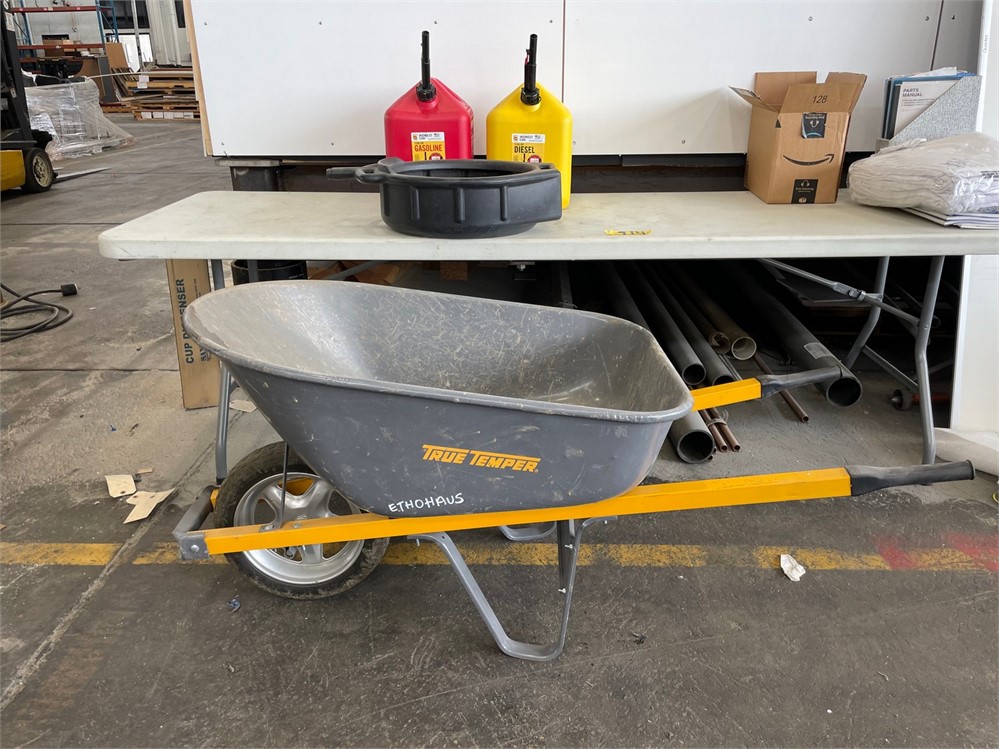 Wheelbarrow and Two (2) Gas Cans