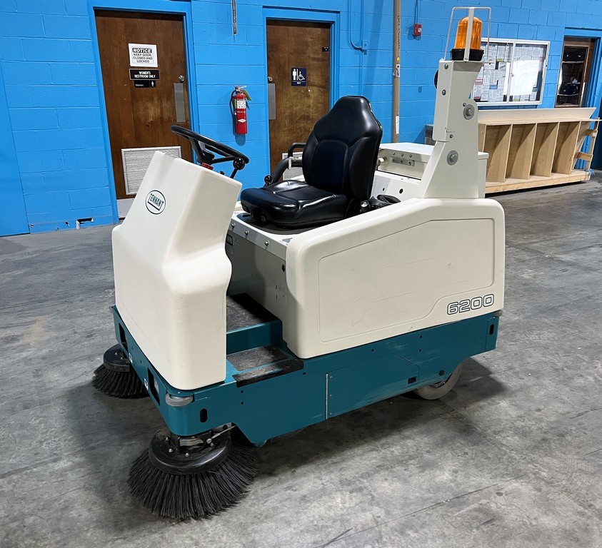 Tennant "6200" Powered Ride-on Floor Sweeper - Battery Powered