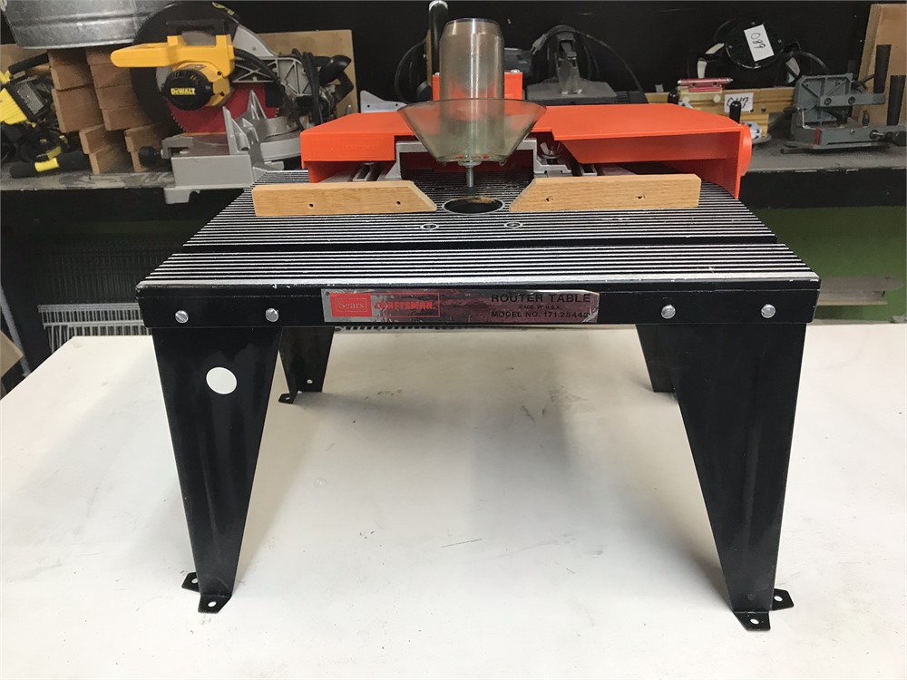 Milwaukee Hand Router and Craftsman Router Table