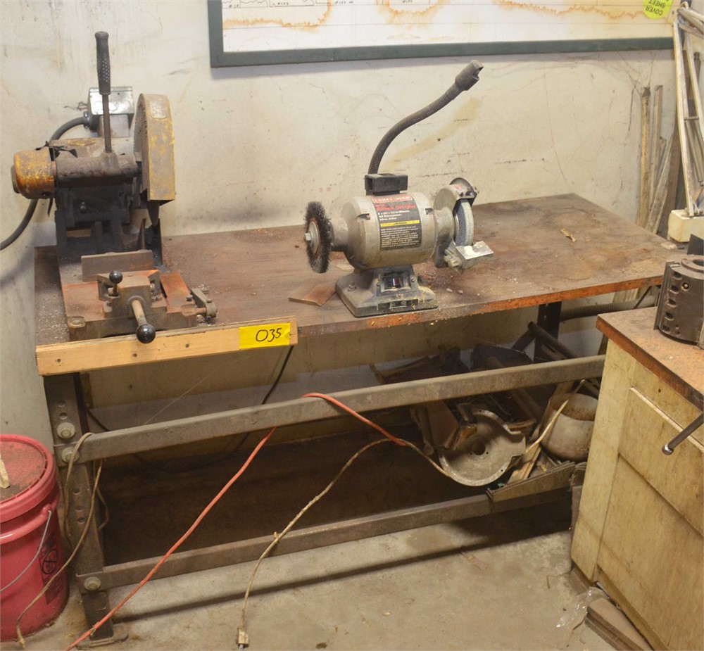 Abrasive cut off saw and grinder on bench